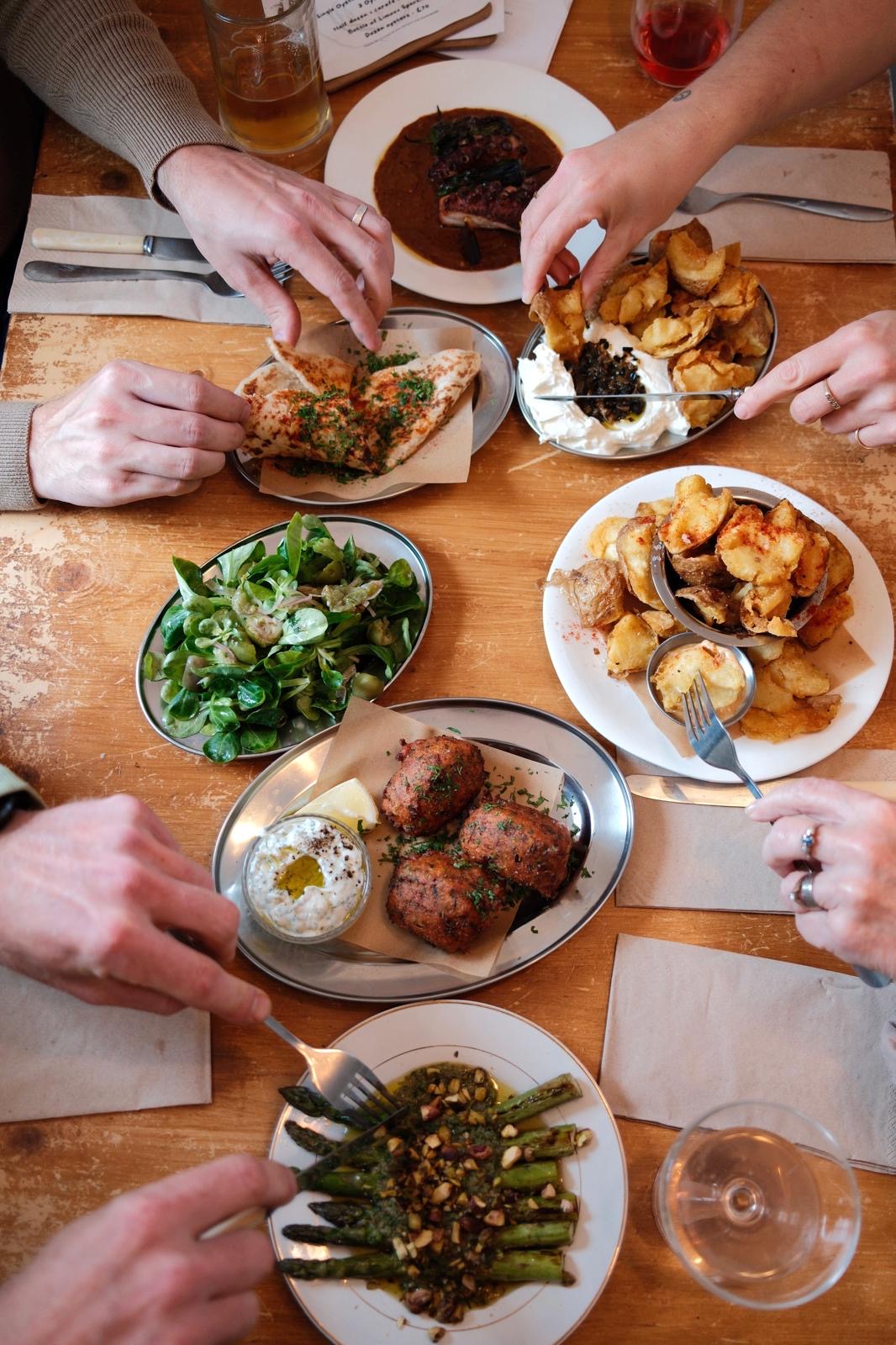 Shared plates across a table